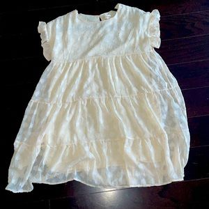 New cream 3tier ruffle dress.  Lined. Button back.  Ruffle sleeves. Sweet style